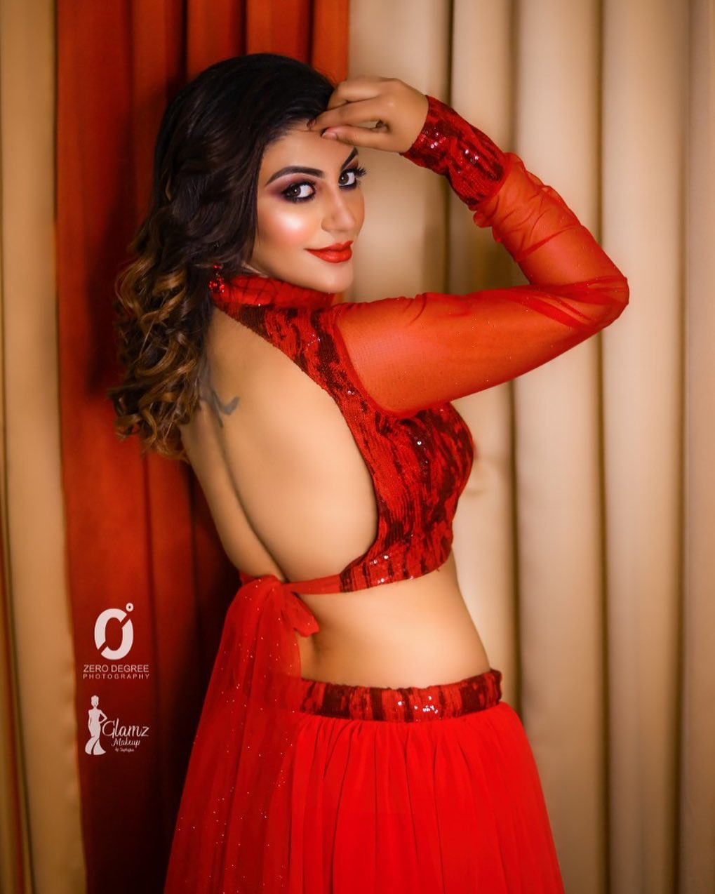Telugu actress Yashika Aannand hot and sexy look in red saree