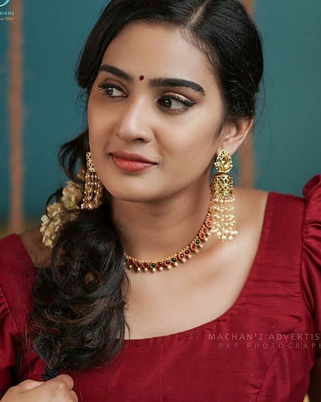 Aditi ravi Kerala style red saree photo gallery