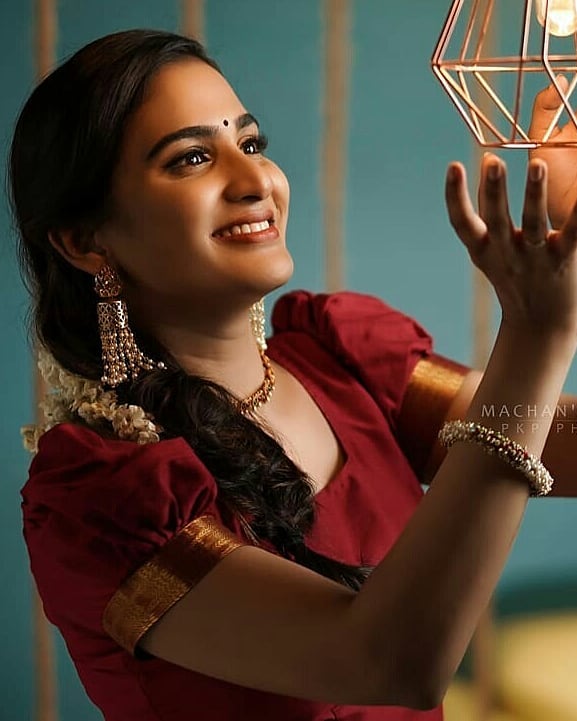 Aditi ravi Kerala style red saree photo gallery