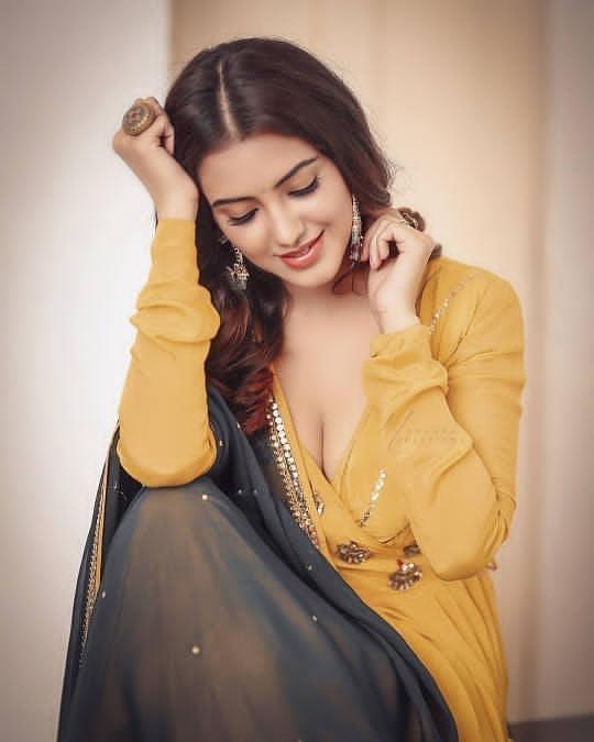 Exposing hot photos gallery | Malvika Sharma showing cleavage photo gallery