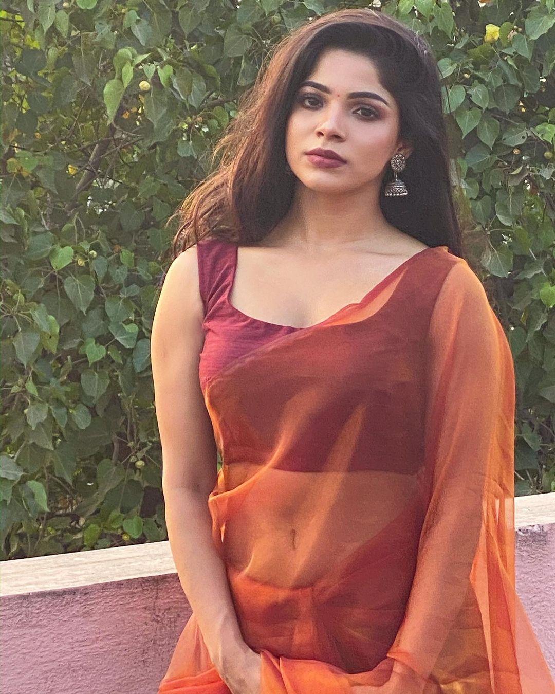 Red transparent saree hot photos | Divyabharathi looking very glorious photo gallery
