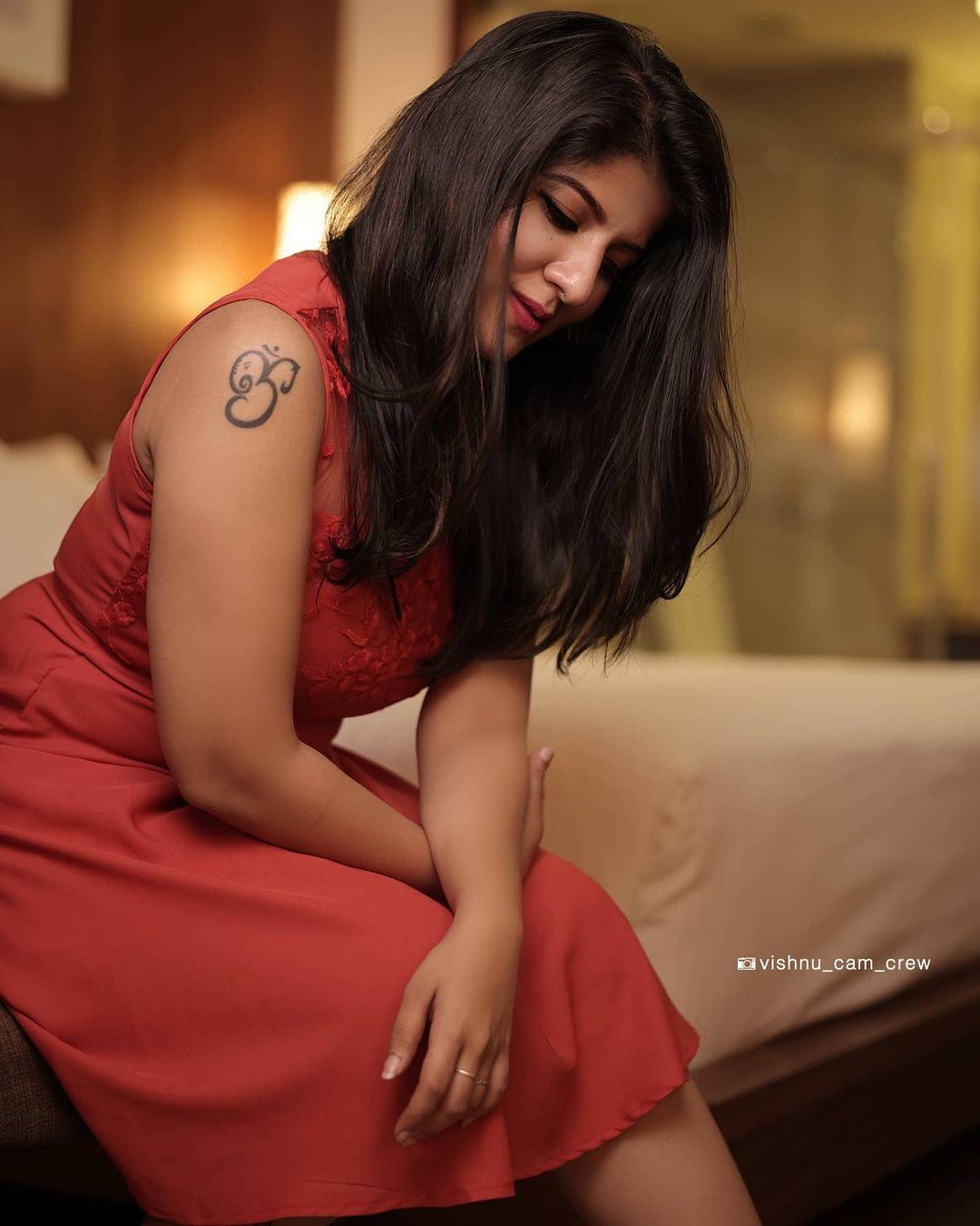 Tattoo design |serial actress Aswathy s nair looking very glamorous photos