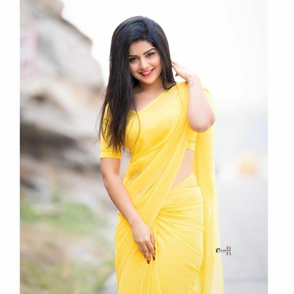 Yellow Saree hot photos gallery | Megha Shetty looking very glamorous photos