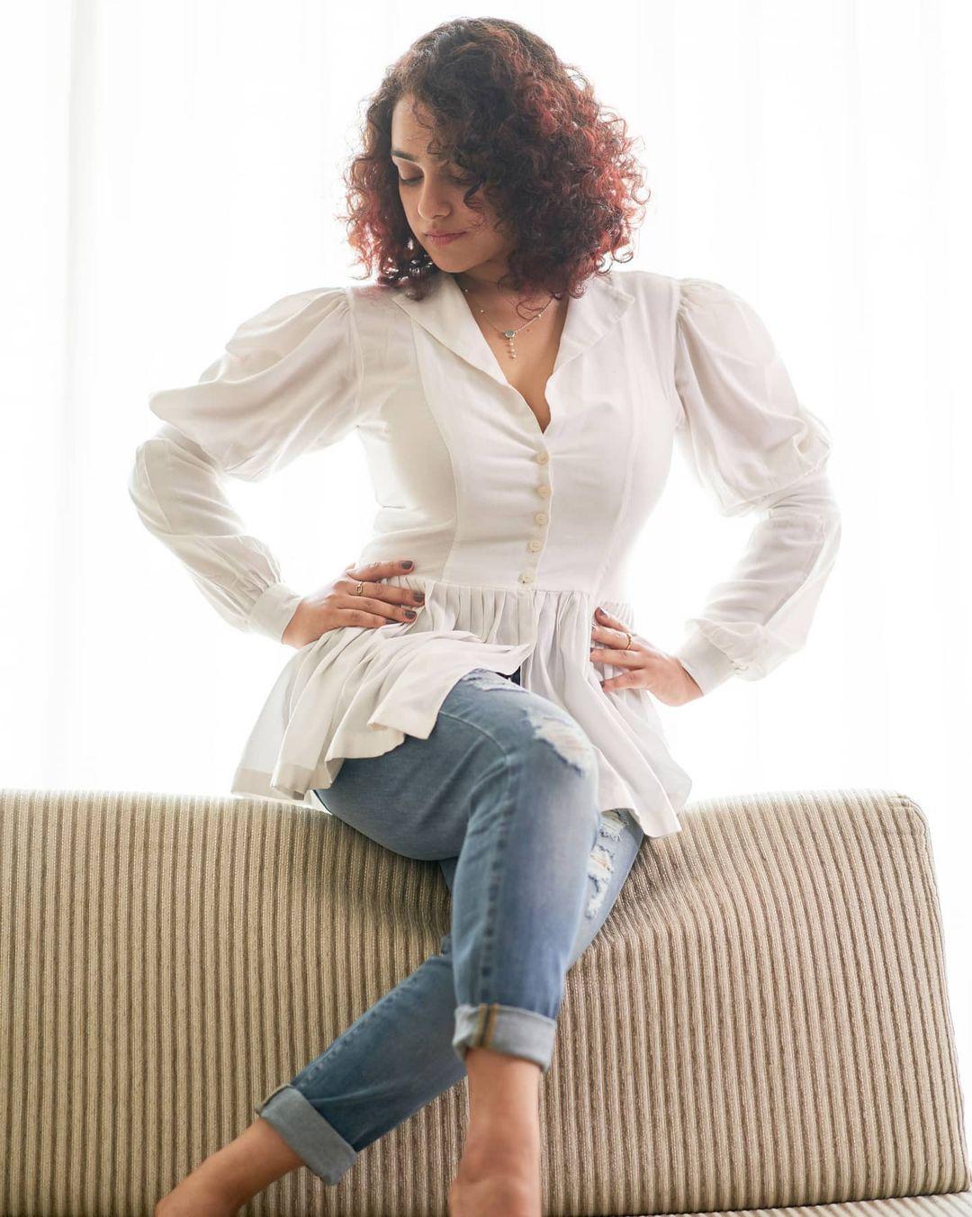 Nithya Menen exposing hot photos gallery | Tamil actress Nithya Menon hot and glamorous photos