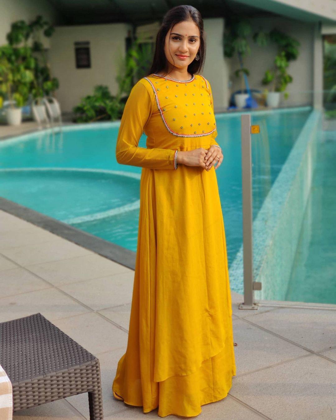 Aditi Ravi looking very attractive hot photos gallery| Aditi Ravi in Yellow dress hot photos gallery