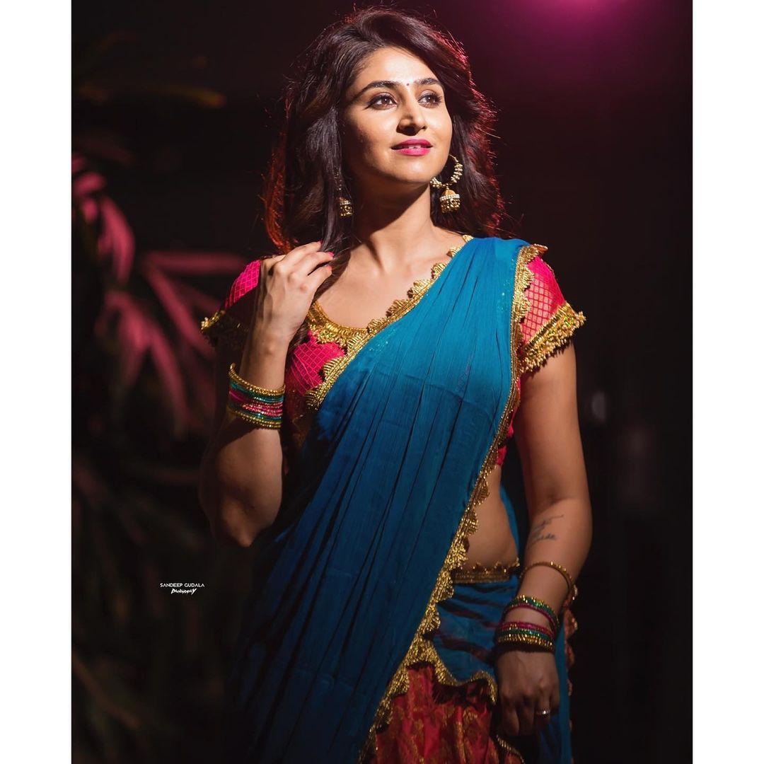 Model Varshini Sounderajan looking very hot photos gallery| half saree hot photos gallery