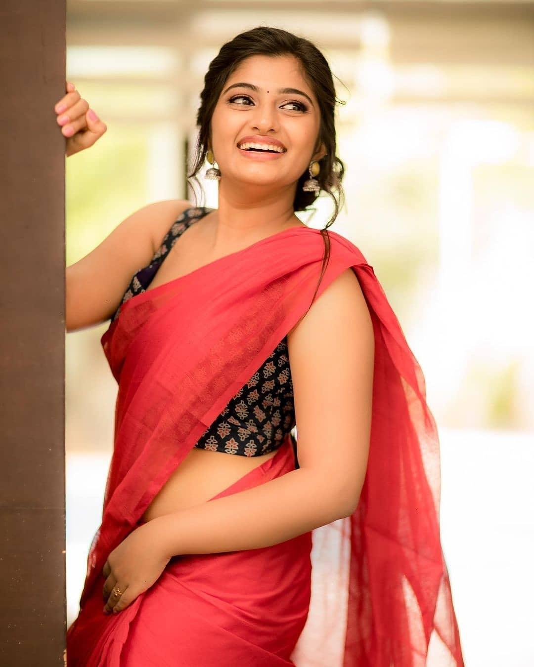 Beautiful actress Archana R hot saree photos | Archana R in red color saree photos