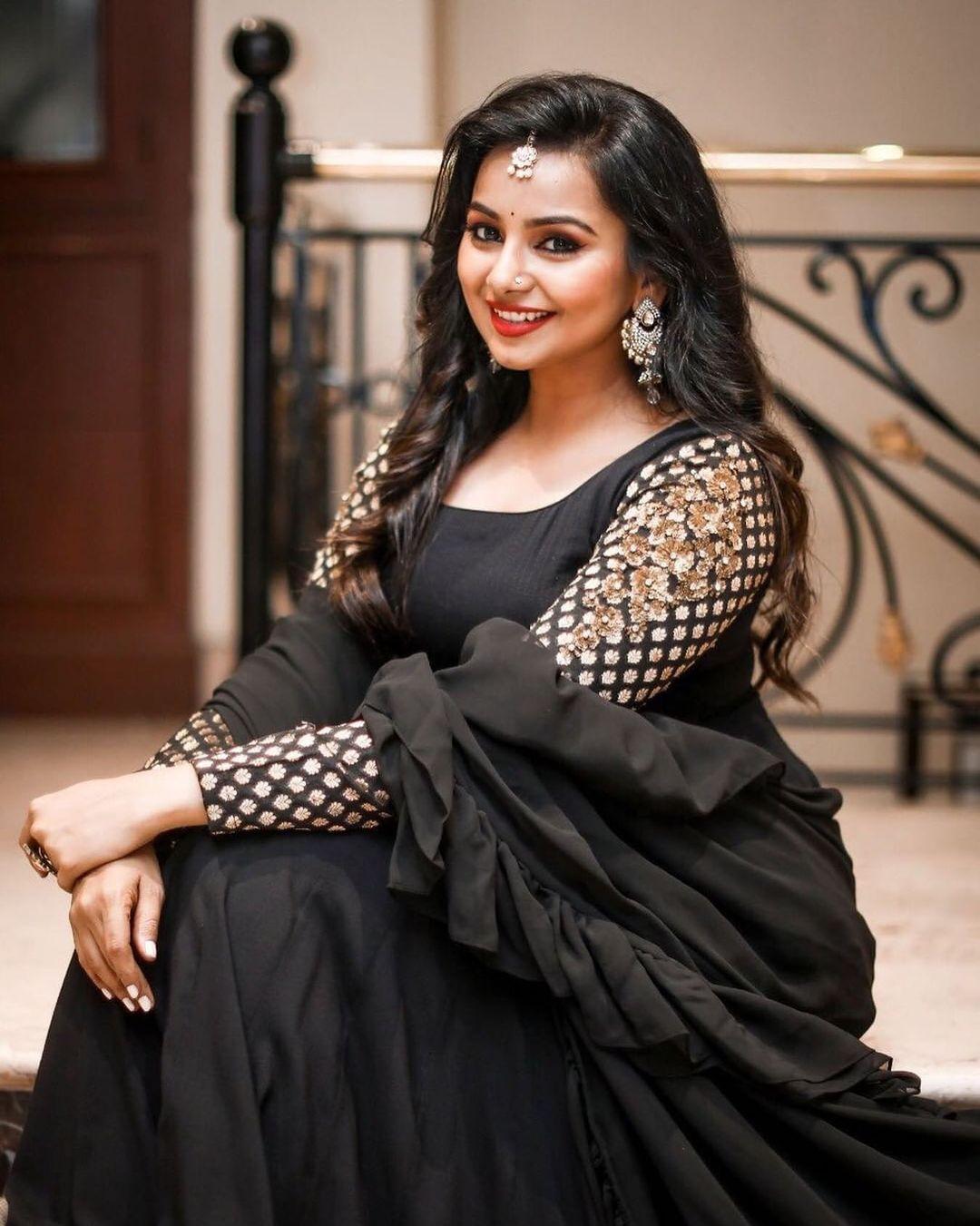 Mrudula murali in black dress hot and sexy photoshoot | Mrudula murali exposing latest hot photos gallery
