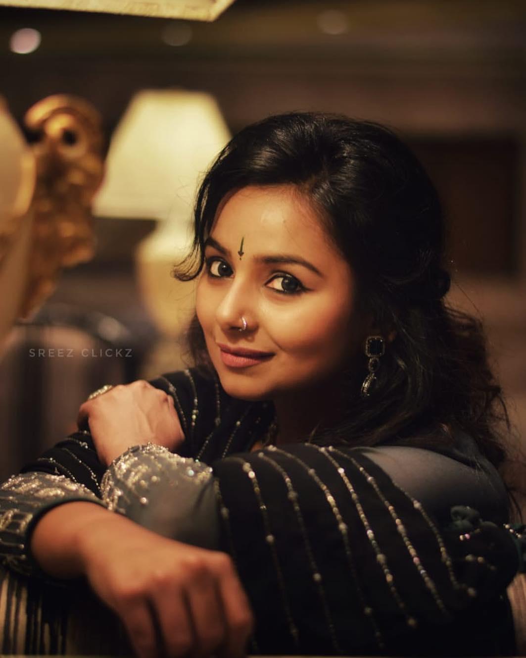 Mrudula murali in black dress hot and sexy photoshoot | Mrudula murali looking very attractive hot stills