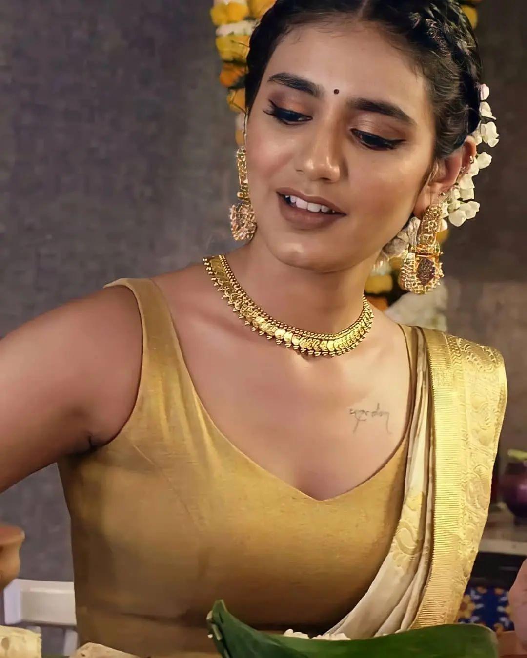 Onam special photos | Priya Prakash Varrier in saree hot photos | Priya Prakash Varrier hot and spicy photos gallery