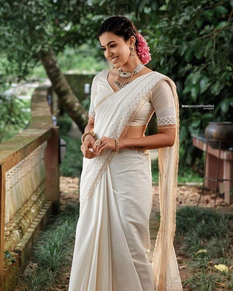 Onam celebration photos | Anju Kurian latest hot and spicy photos gallery
