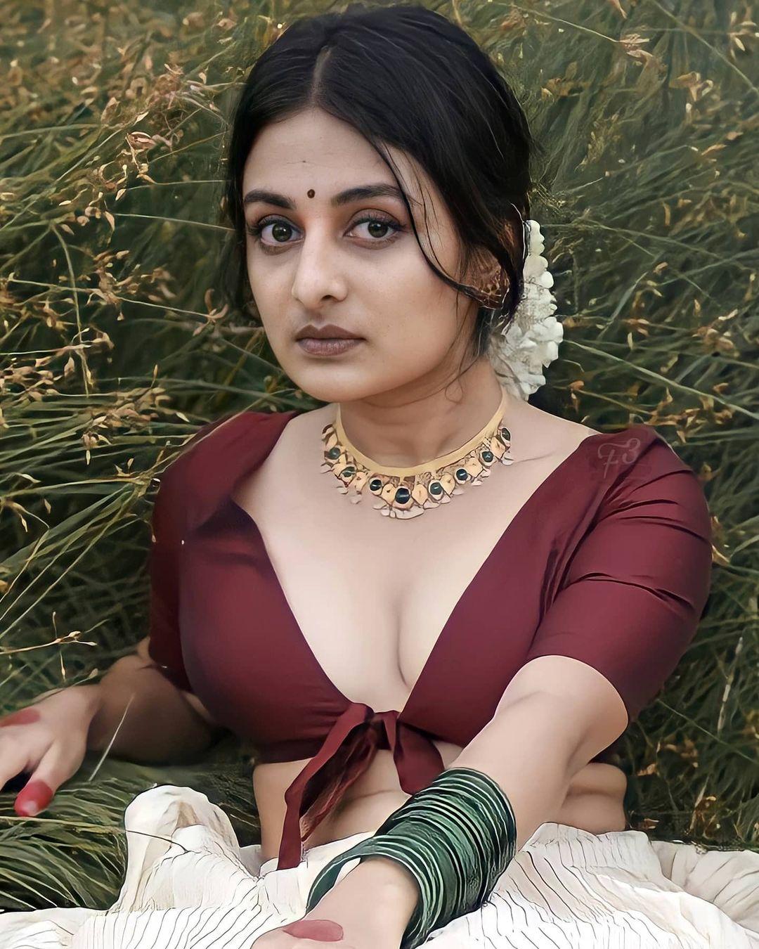 Esther anil latest hot and sexy stills| Esther anil exposing cleavage hot photos | Esther anil