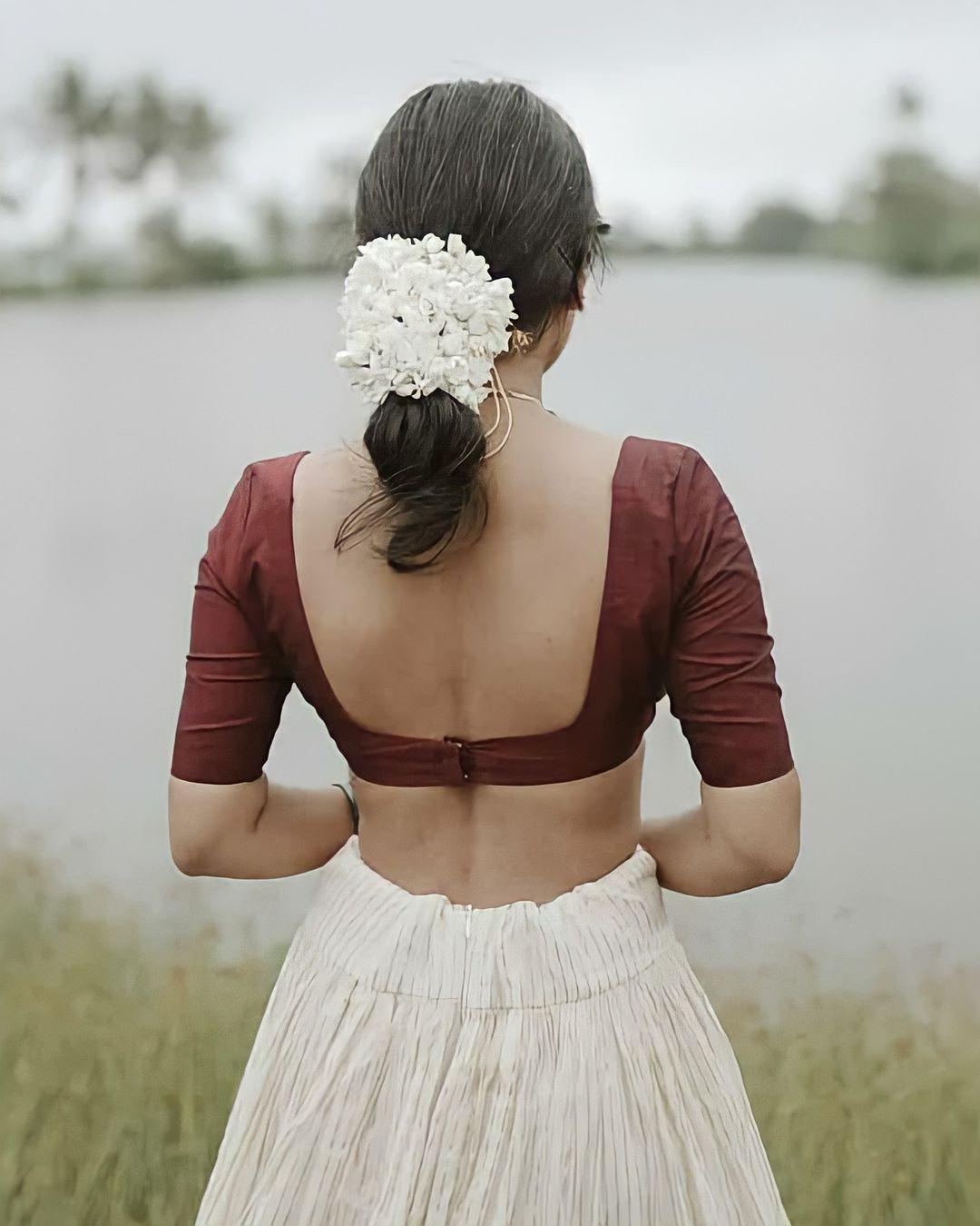 Esther anil in blouse hot photos gallery | looking very glamorous photos