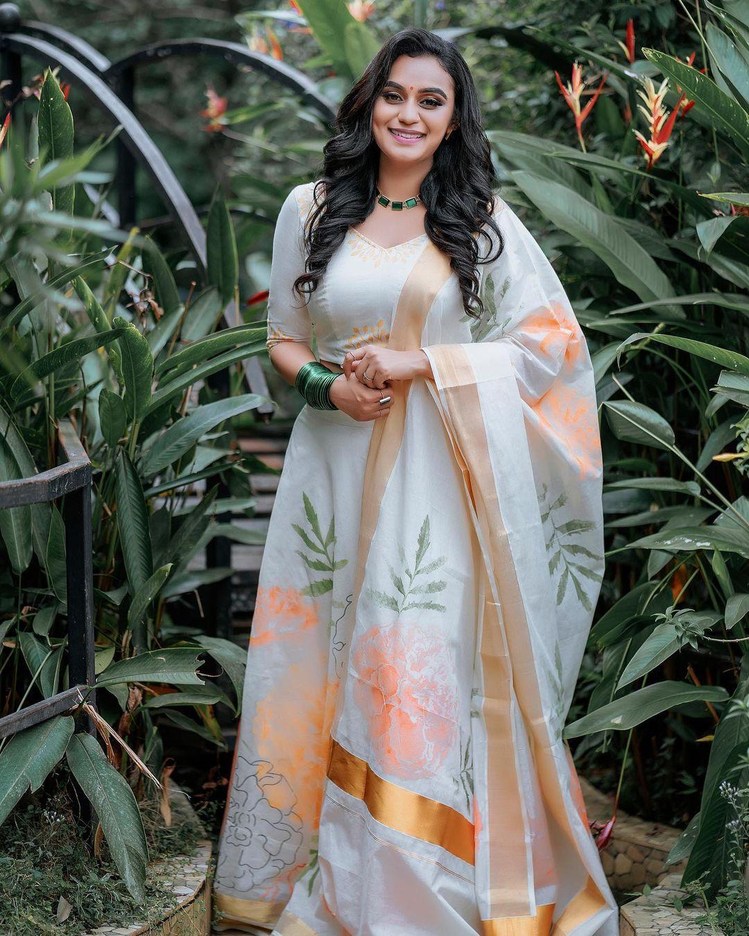 Lakshmi Nakshathra in ethnic churidar photos | Malayalam Anchor Lakshmi Nakshathra latest hot and spicy photos