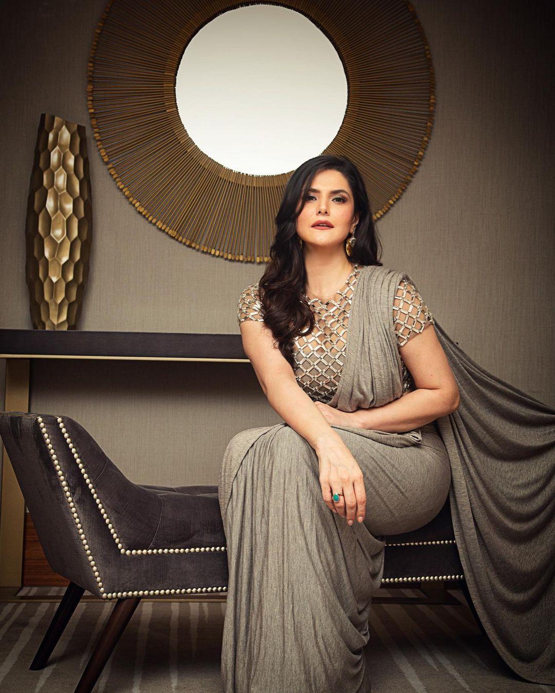 Bollywood actress Zareene Khan saree hot photos gallery | looking very glamorous and cute photos