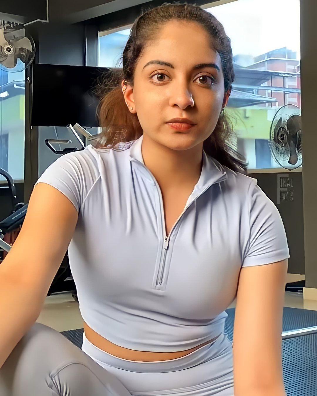 Ishaani Krishna workout at gym photos | Ishaani Krishna in white dress hot photos gallery