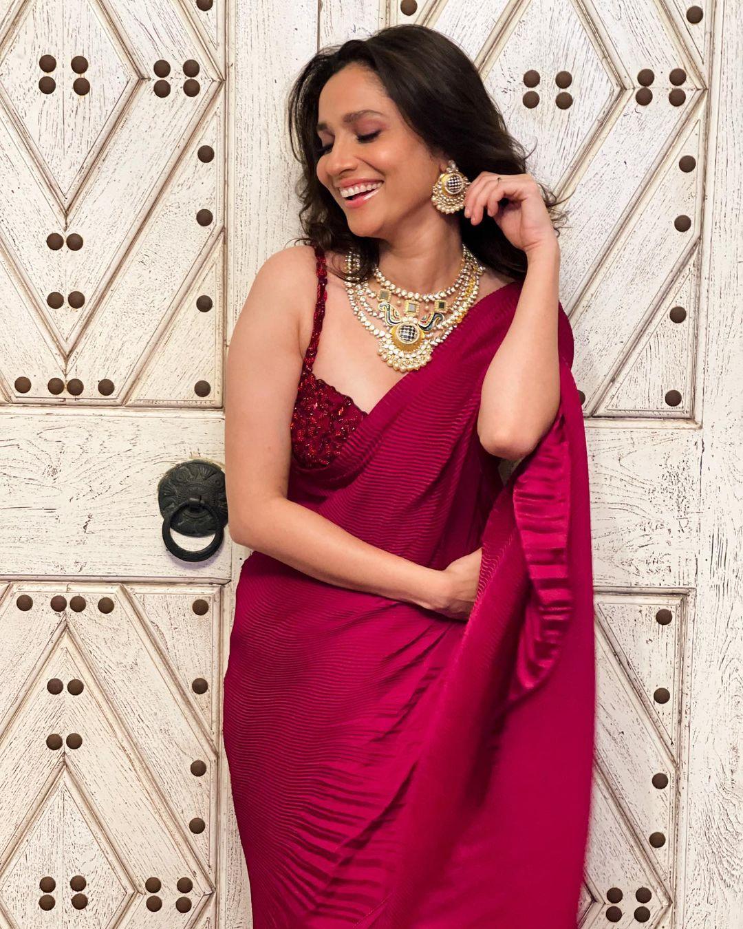 Bollywood actress Ankita Lokhande in red saree hot photos | exposing hot and sexy photoshoot