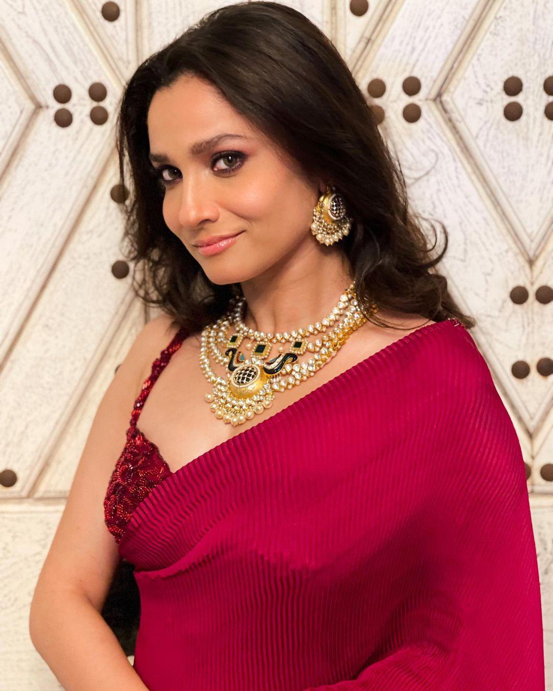 Bollywood actress Ankita Lokhande in red saree hot photos | looking very attractive and hot stills