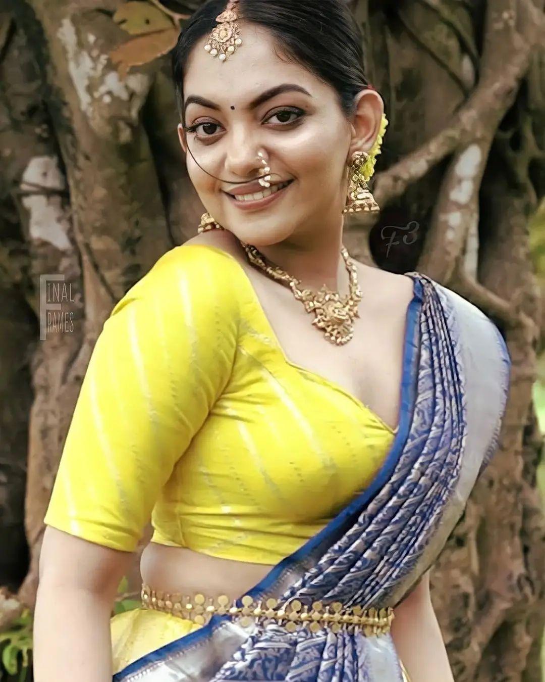 South Indian actress Ahaana krishna in Saree hot photos | Ahaana krishna exposing hot photos gallery
