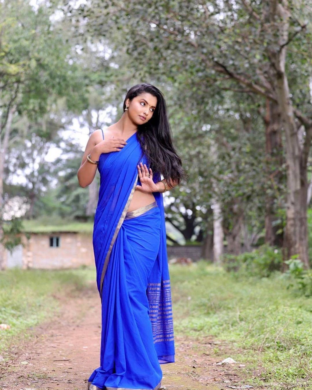 Anicka Vikhraman in blue saree hot and sexy photoshoot | Anicka Vikhraman latest hot and spicy photos gallery