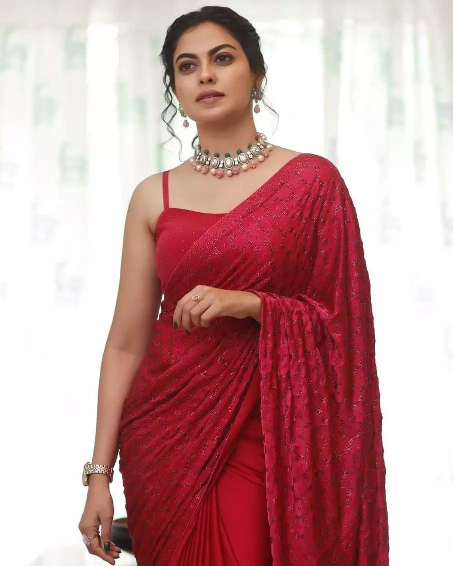 Anusree in sleeveless blouse hot and spicy photos in red saree |Anusree exposing hot and spicy photos