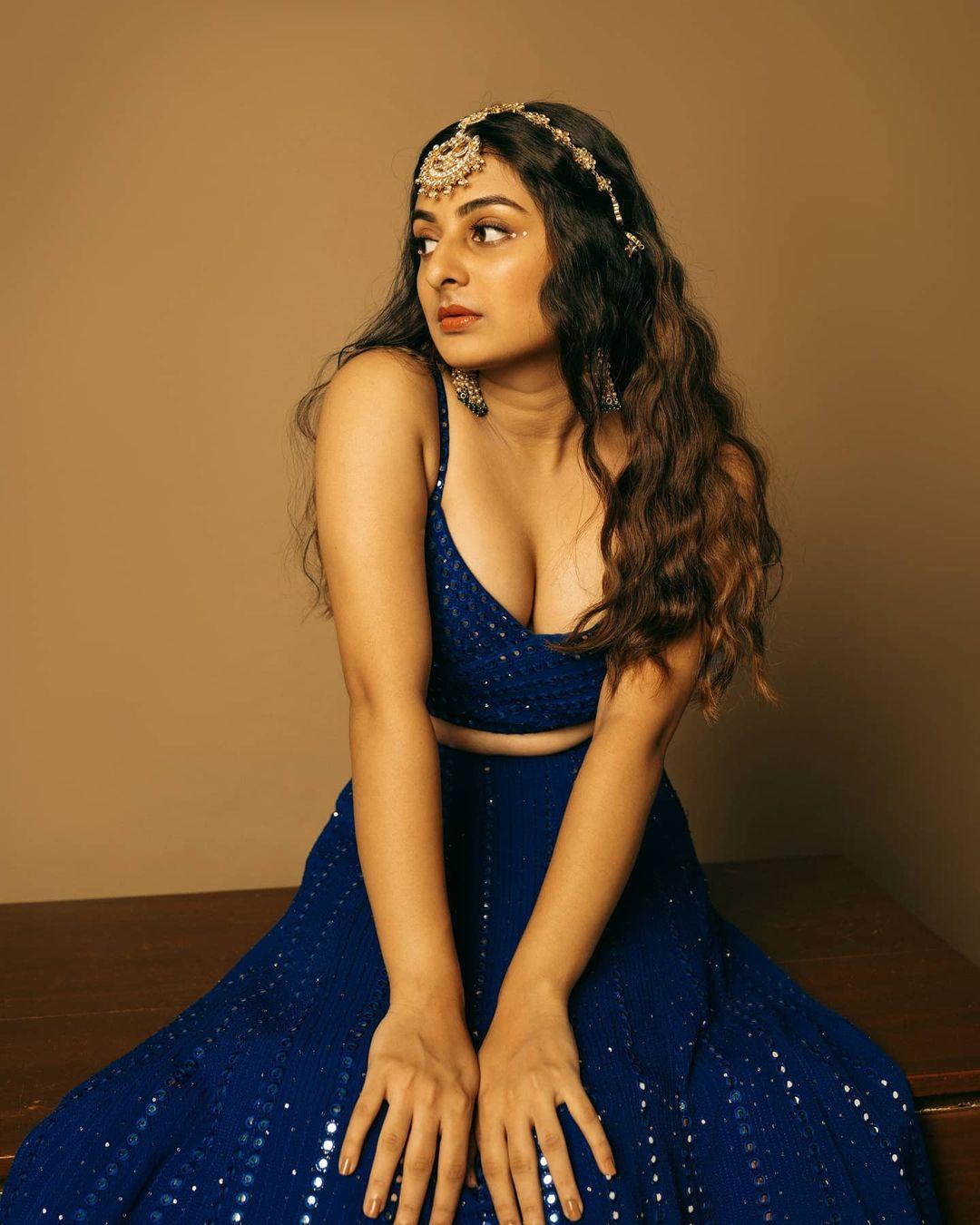 Esther anil in blue lahanga exposing cleavage photos gallery | very glamorous and cute stills