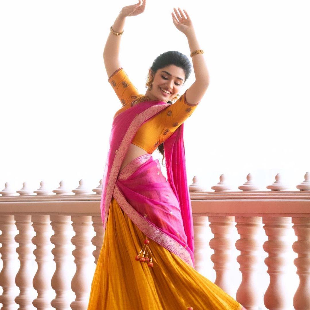 Krithi Shetty in half saree looking very glamorous photos gallery | Krithi Shetty looking very attractive hot photos gallery