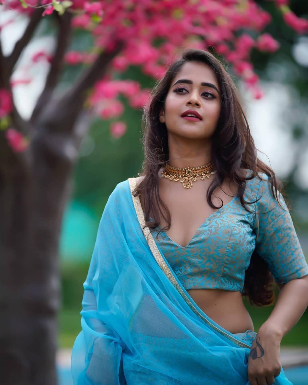 Deepthi Sunaina in exposing cleavage hot photos gallery | Deepthi Sunaina in blue dress hot photos gallery