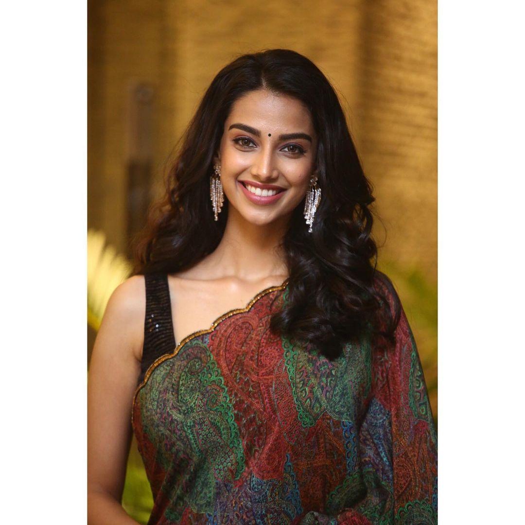 Meenakshi Chaudhary in saree hot and spicy photos gallery | exclusive hot and sexy stills