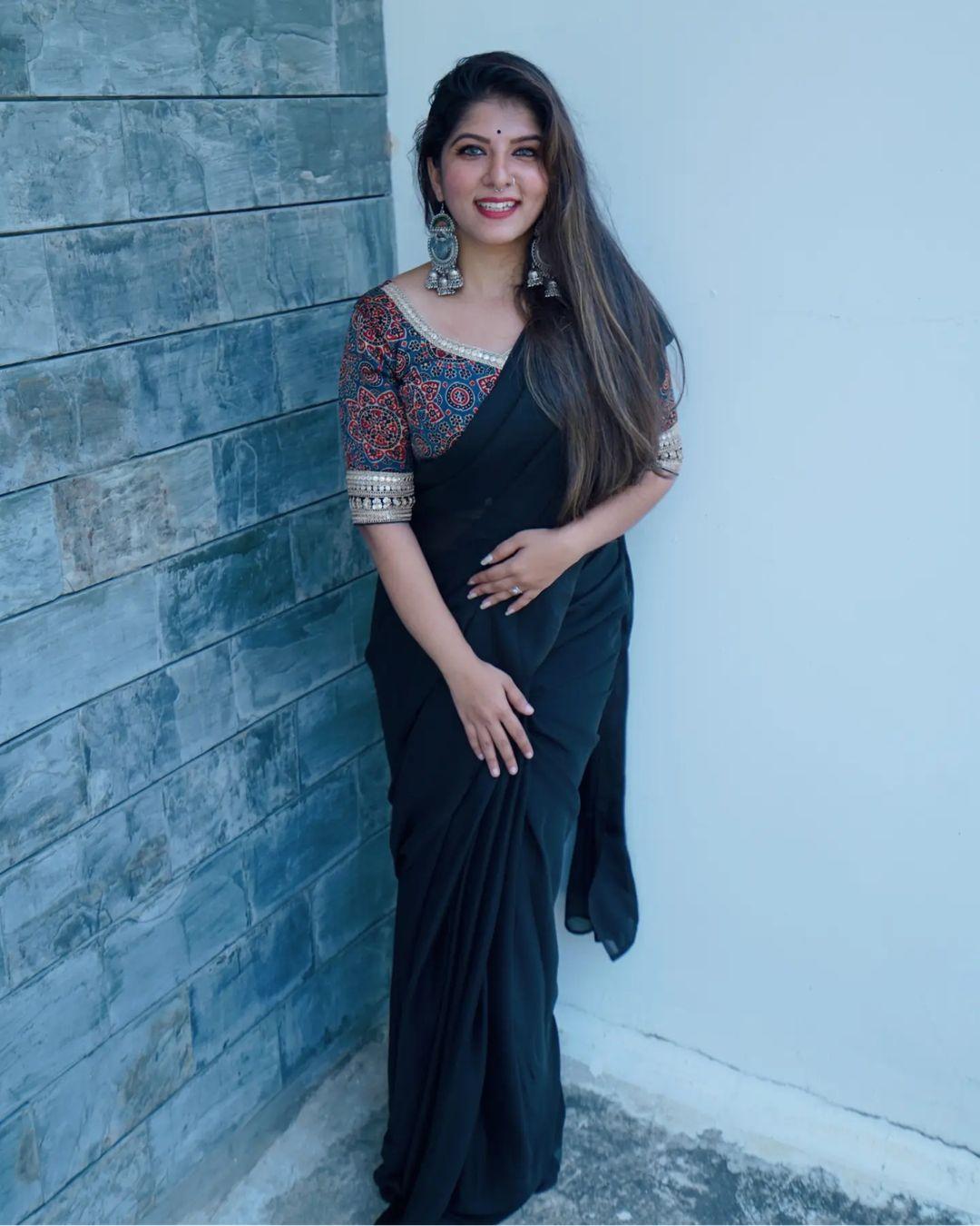Aswathy s nair in black saree hot photos gallery | looking very glamorous and cute stills