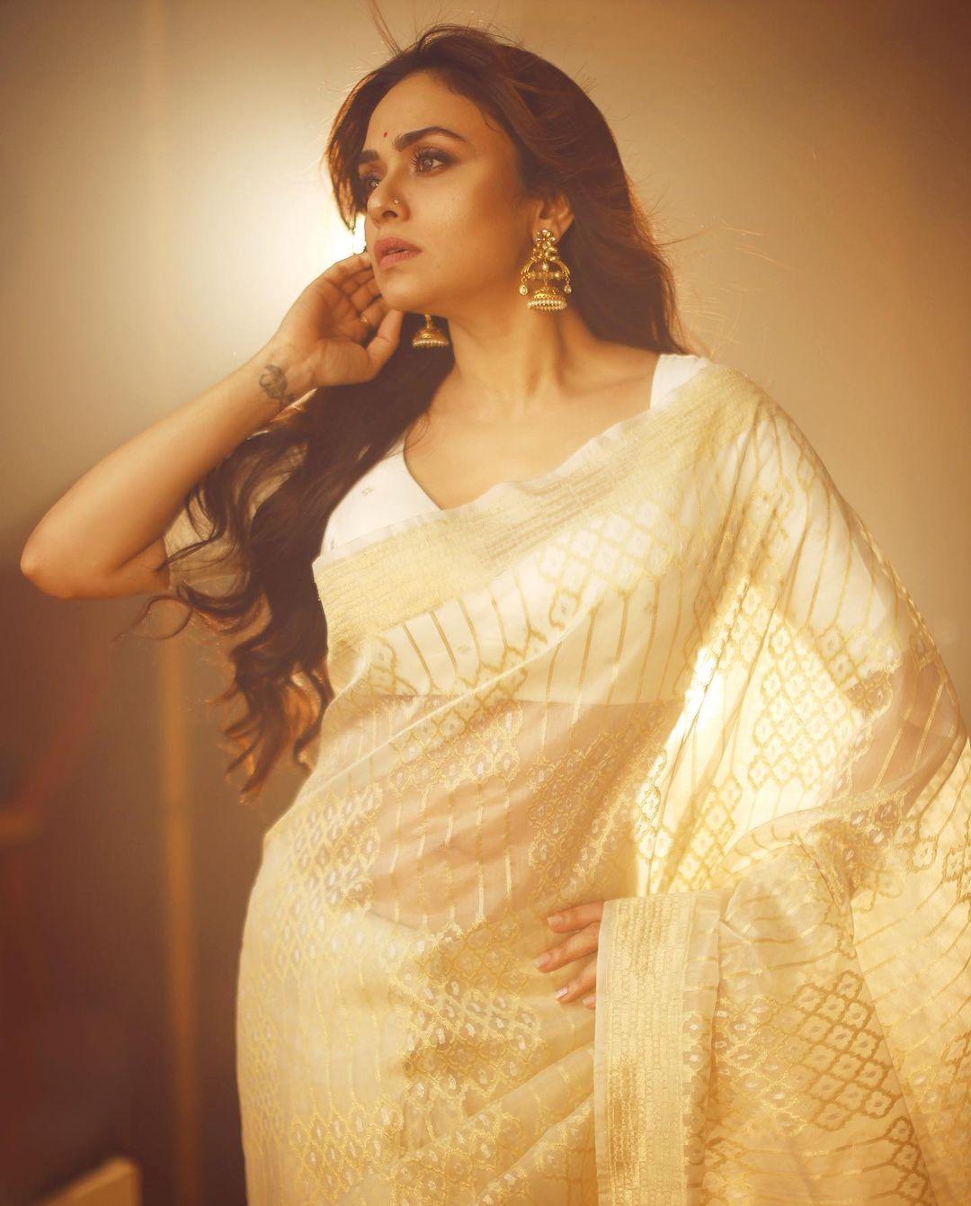 Amruta Khanvilkar in exclusive hot and sexy photos in saree | beautiful and glamours photos