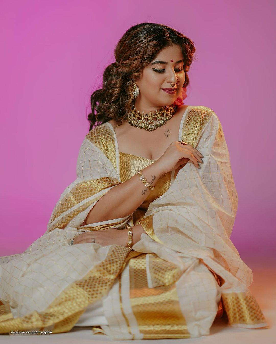 Aparna thomas in vishu special Kerala saree hot photos gallery | latest hot and sexy photos