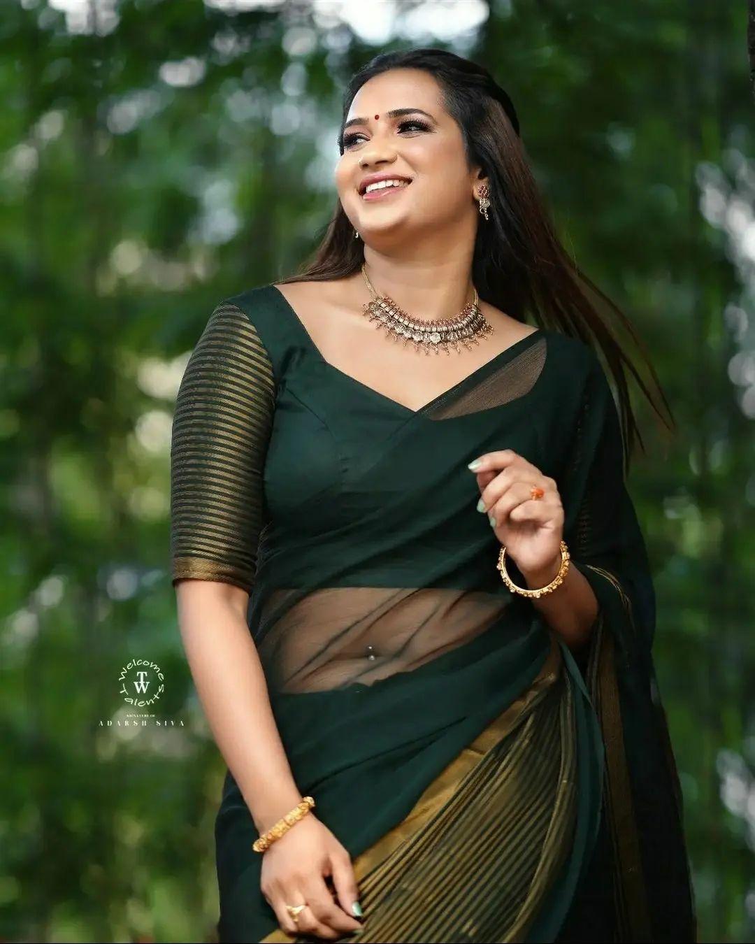 Malayalam serial actress Saranya Anand exposing navel and hot photos | beautiful and sexy photoshoot