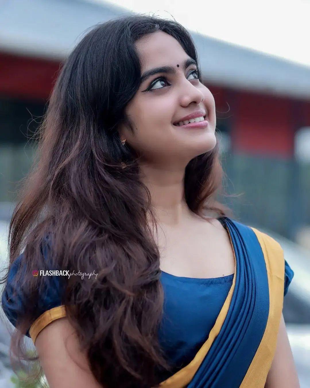 Beautiful and glamours actress Devika Sanjay in blue saree hot photos| looking very glamours photos