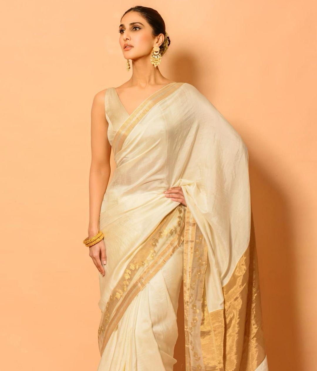 Bollywood actress Vaani Kapoor in White saree hot photos | beautiful and cute stills