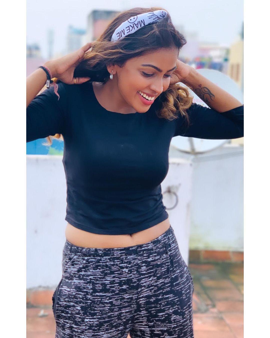 Tamil actress Sri Nikha and n black t shirt exposing hot photos | latest hot and spicy stills