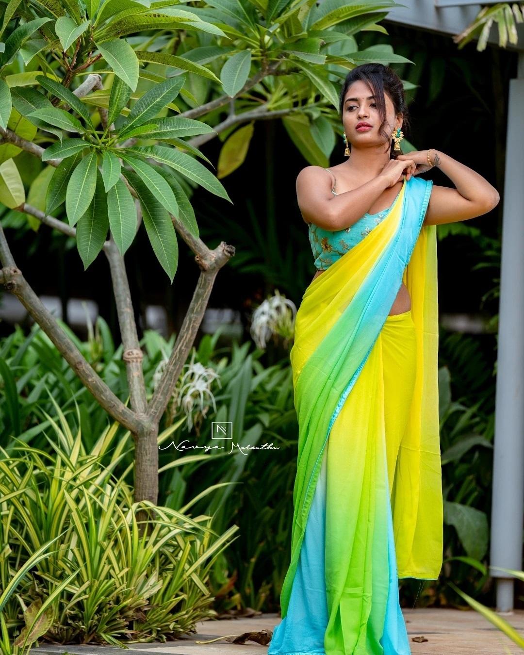 Alekhya Harika in Yellow color sleeveless blouse and saree hot photos | beautiful and glamours photos