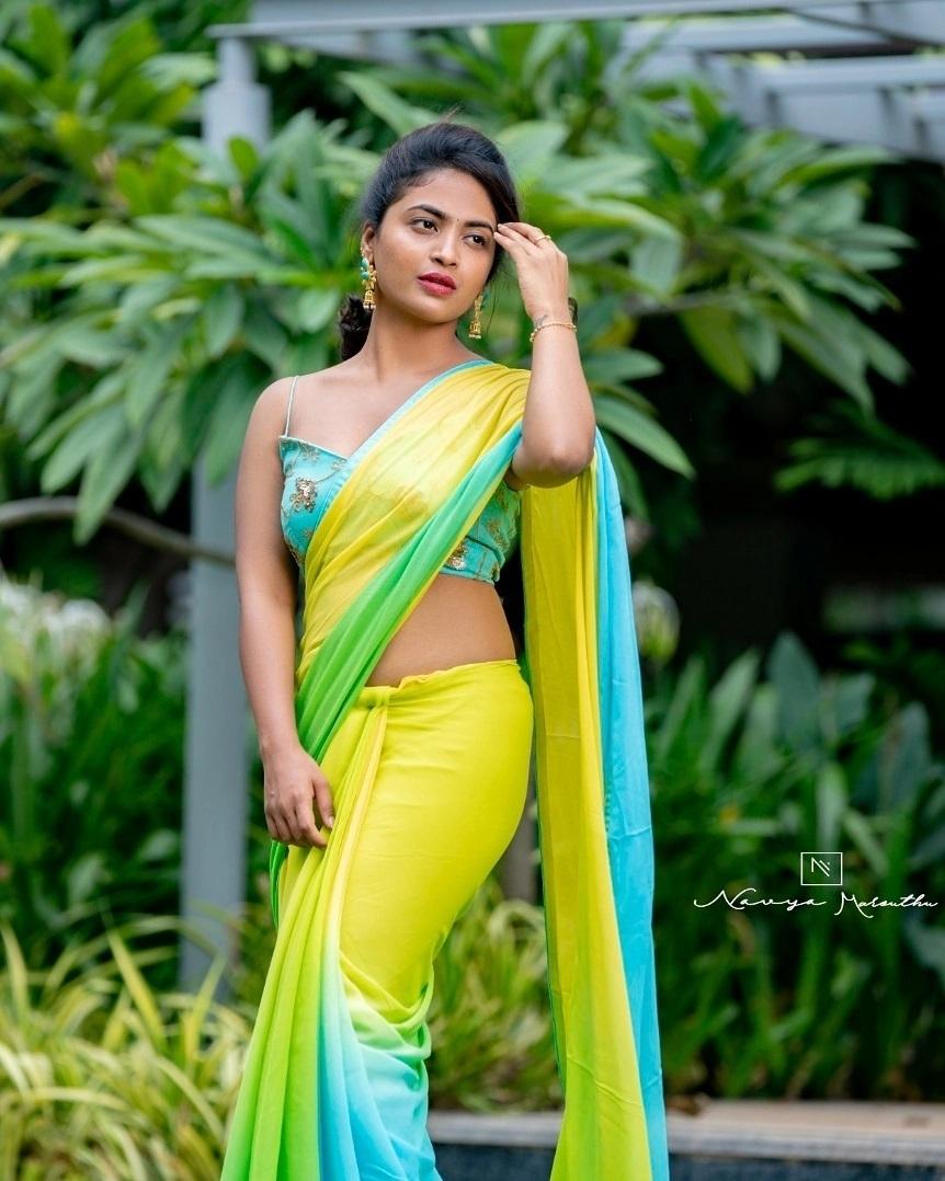 Alekhya Harika in Yellow color sleeveless blouse and saree hot photos | beautiful and glamours picture