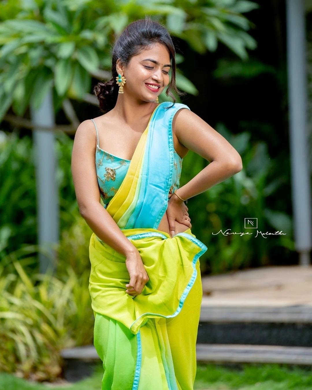 Alekhya Harika in Yellow color sleeveless blouse and saree hot photos | beautiful and sexy photoshoot