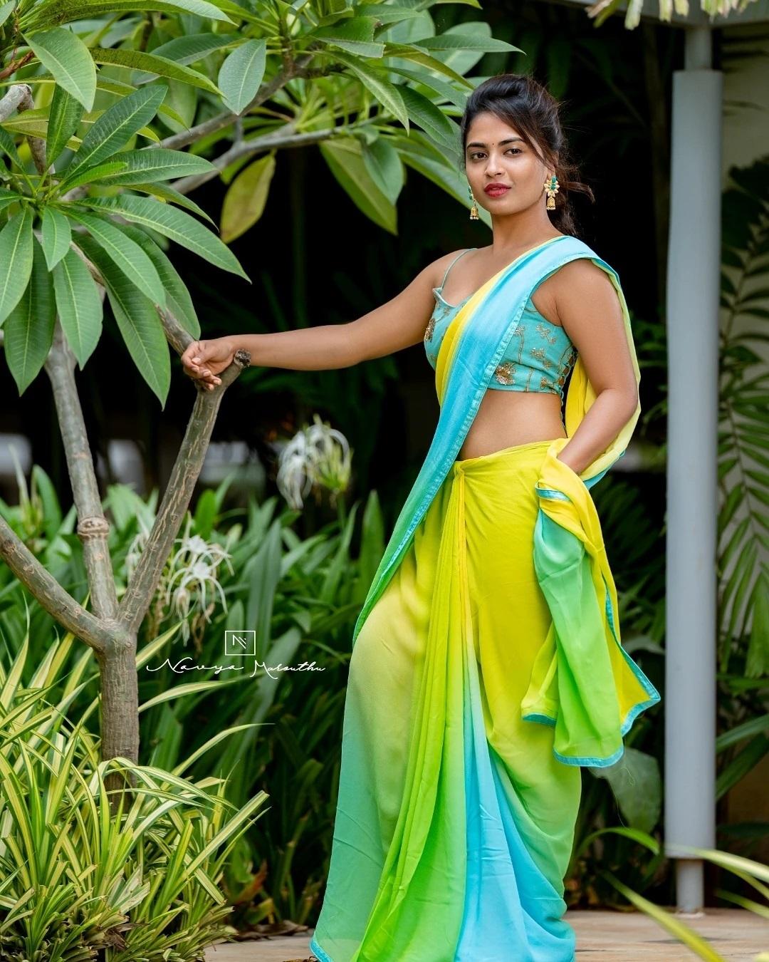 Alekhya Harika in Yellow color sleeveless blouse and saree hot photos | looking very glamours and cute stills