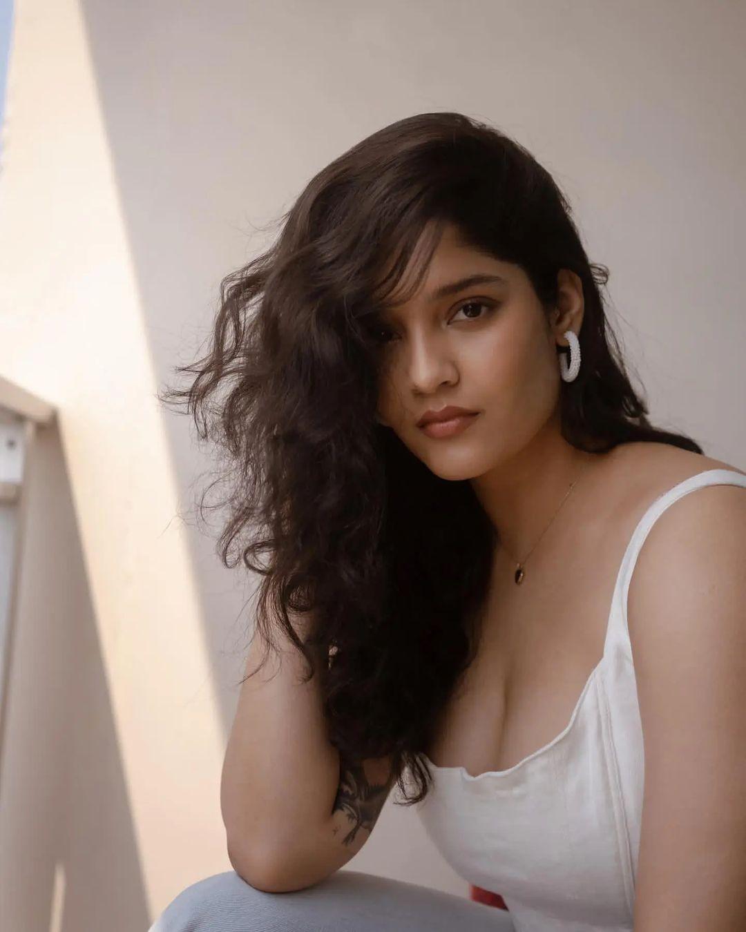 South Indian actress Ritika Singh exposing cleavage photos in white dress | hot and sexy photoshoot