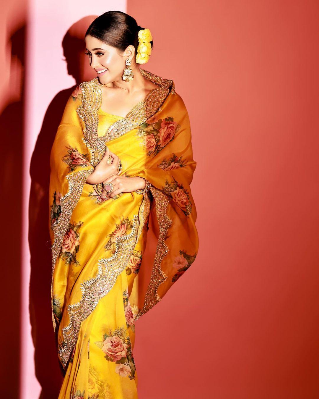 Shivangi Joshi looks gorgeous in a yellow saree photos | exclusive hot and sexy photoshoot