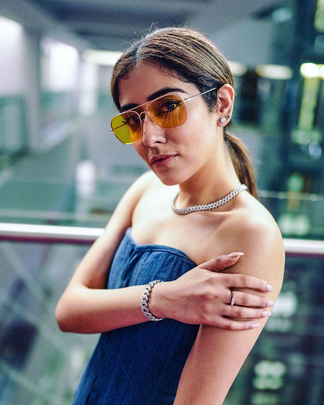 Jonita Gandhi looking very glamours and sexy photos gallery