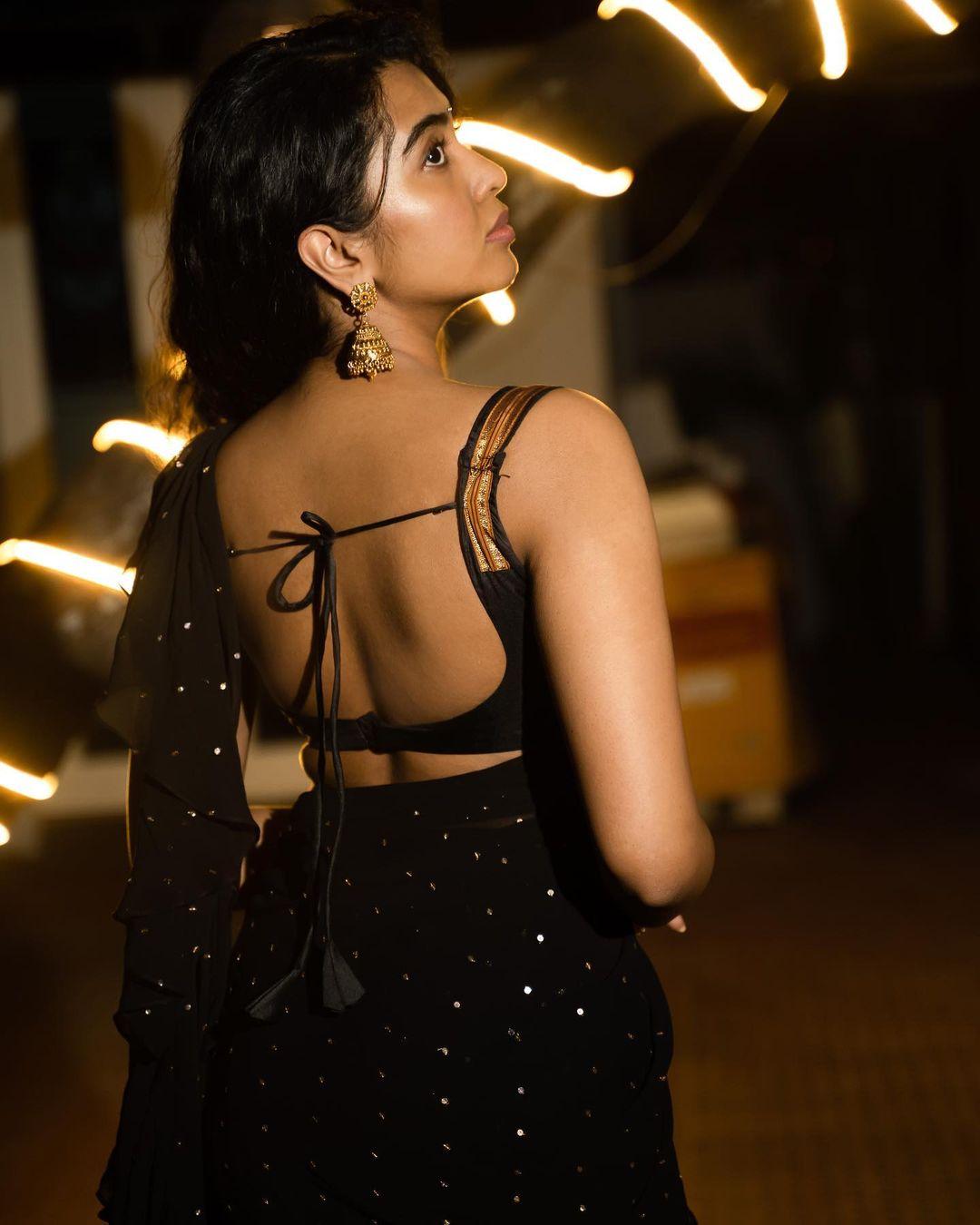 South Indian actress Shivathmika Rajashekar in black saree hot photos