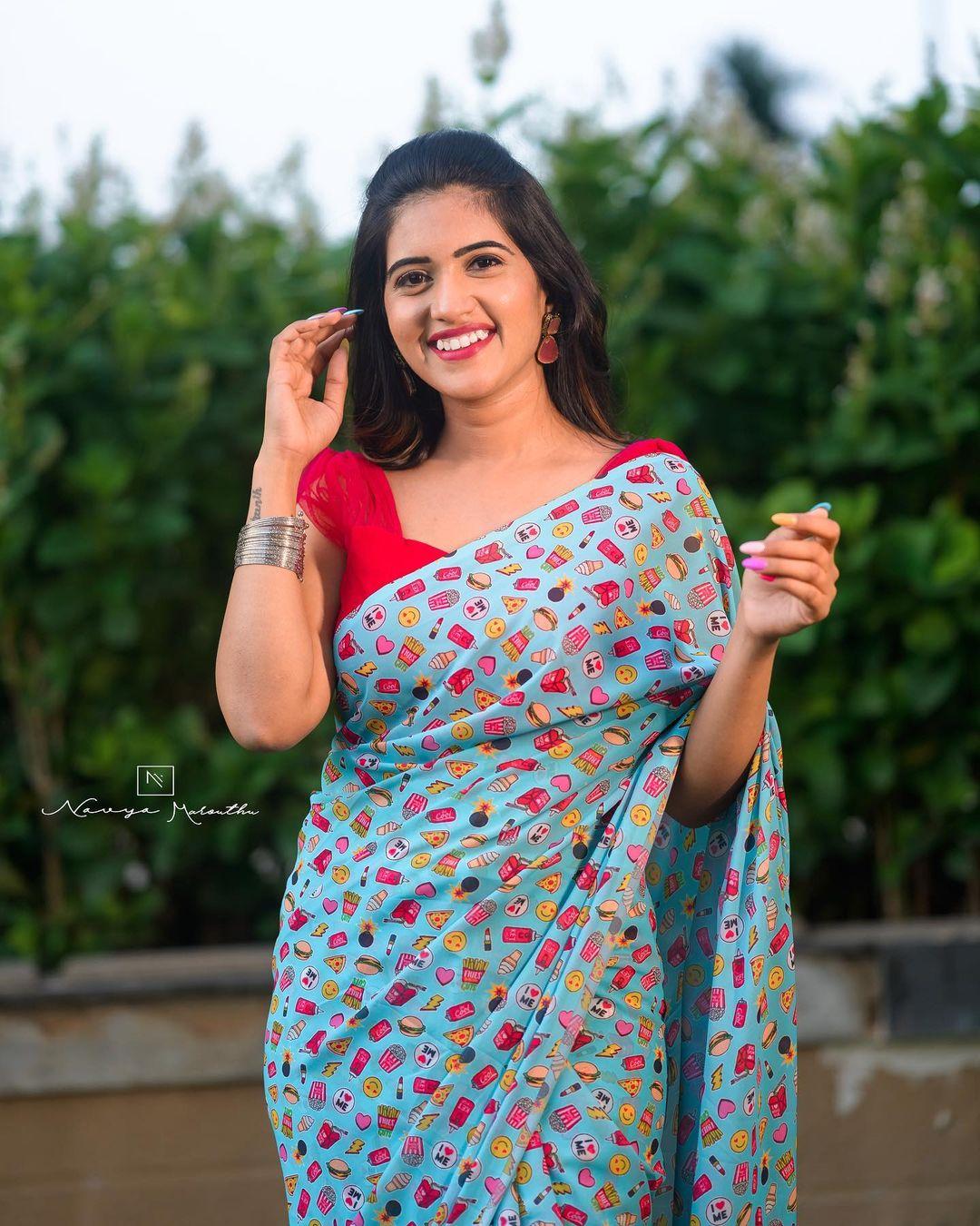 Beautiful and sexy stills | Sravanthi Chokkarapu in saree hot and sexy photoshoot