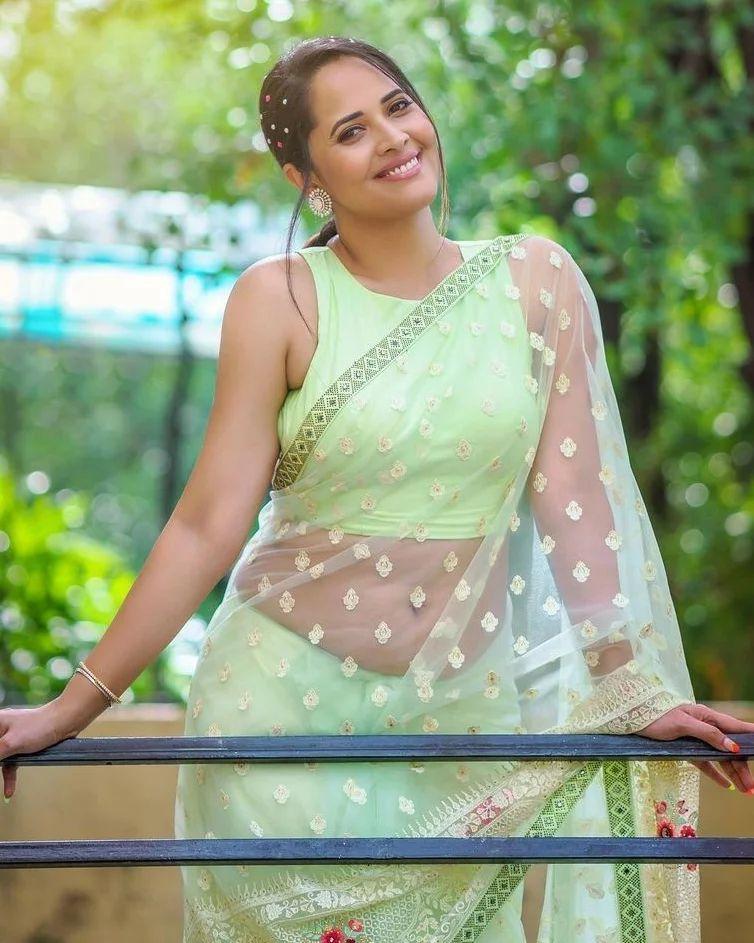 Beautiful and sexy photoshoot | Anasuya Bharadwaj in yellow transparent saree hot photos