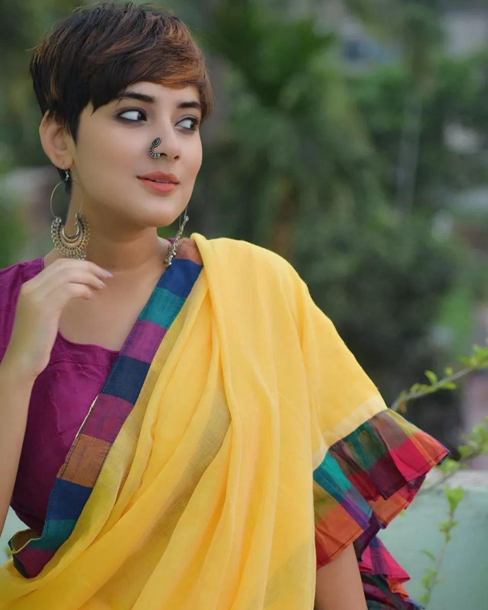 Glamours and cute stills | Archika gupta In yellow saree hot photos gallery
