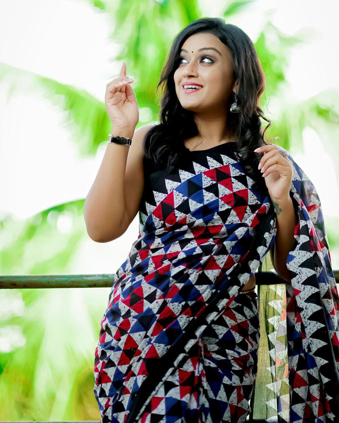 Hot and spicy photos | Varada Jishin hot and sleeveless blouse and saree photos