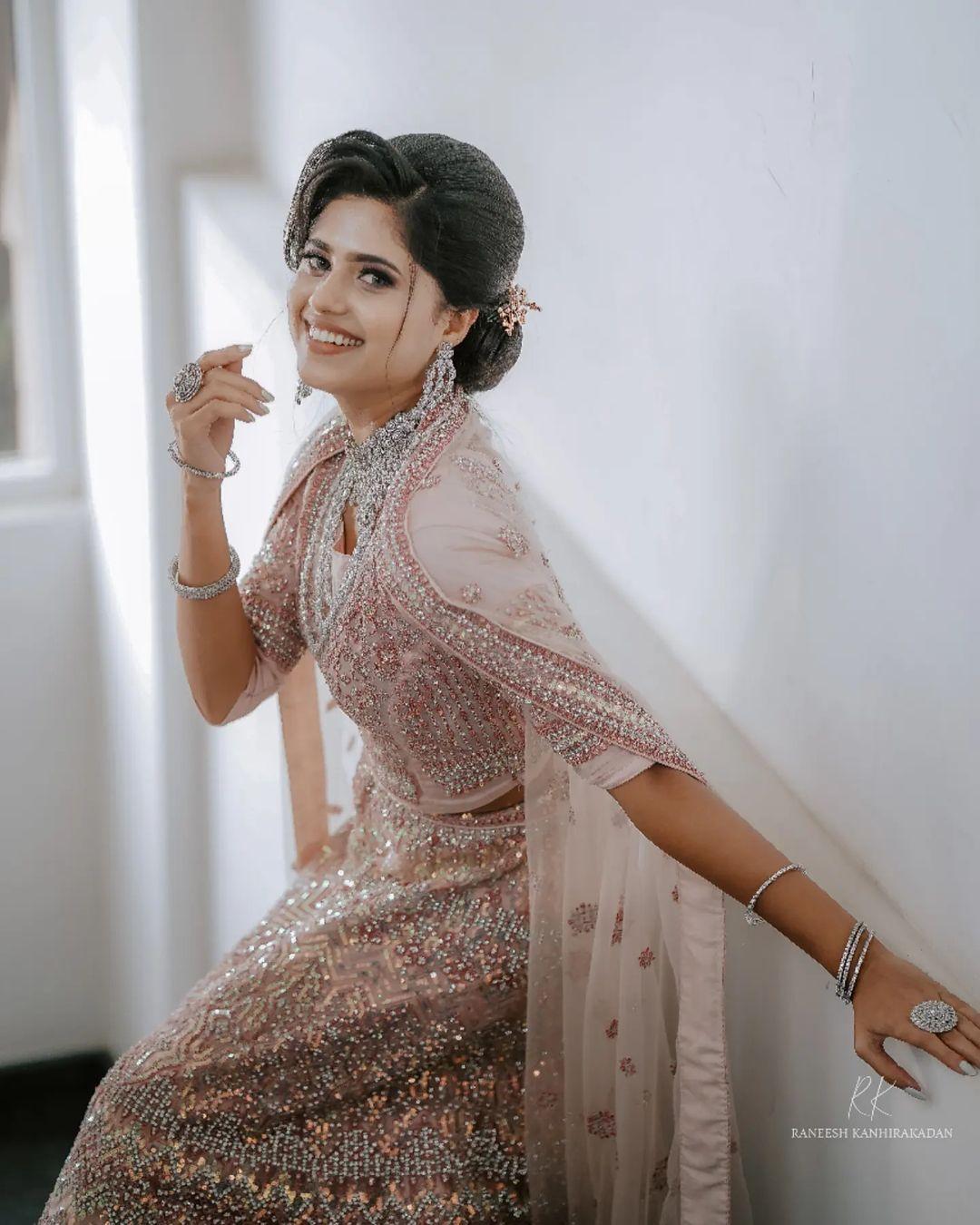 Looking very attractive hot stills | Anju Krishna Ashok in bridal makeup hot and sexy photoshoot