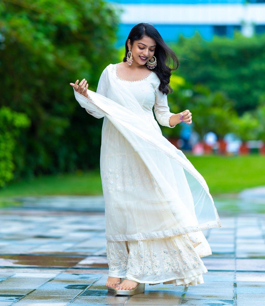 Glamorous and cute picture| Varsha Bollamma in white churidhar hot photos gallery